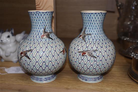 A pair of Japanese earthenware vases, impressed mark height 14.5cm